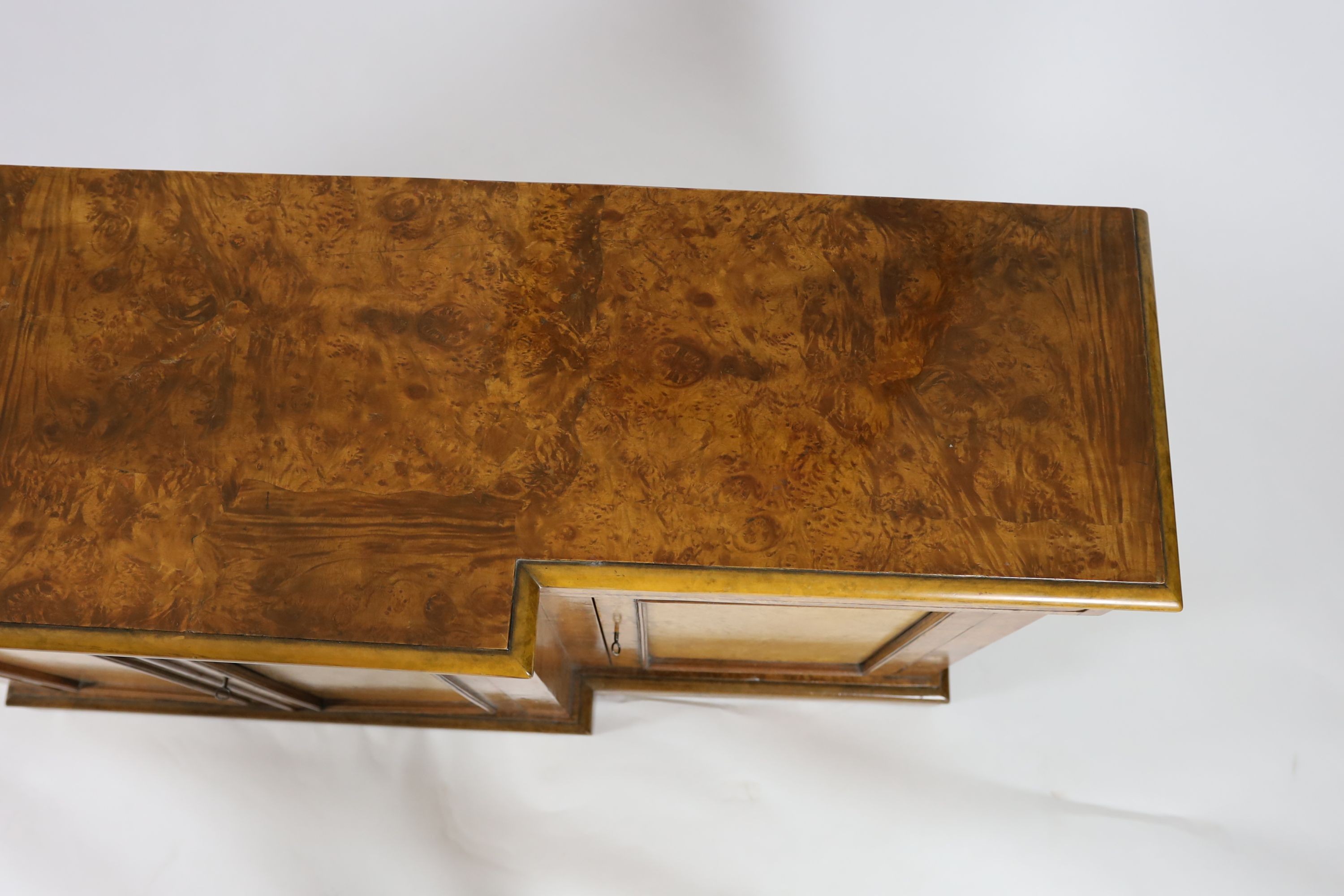 A Victorian walnut breakfront dwarf bookcase, W.195cm D.44cm H.95cm